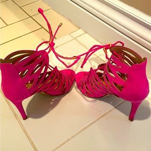 Also bright pink leather sandals.